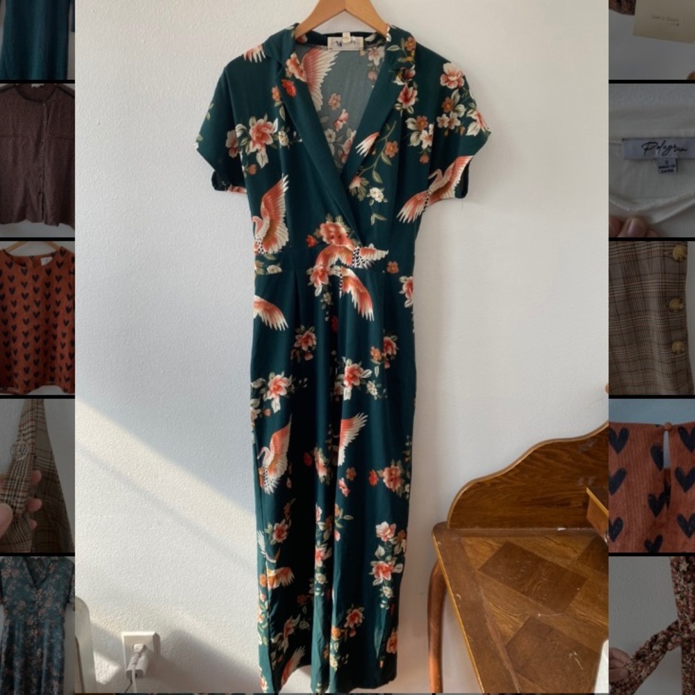 Crane print, emerald green flare leg jumpsuit with tie waist. Zips up side.